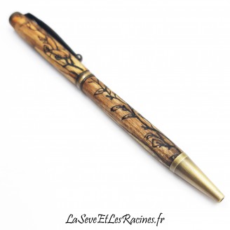 Stylo bille en bois de hêtre gravé avec un motif de branches et de feuilles